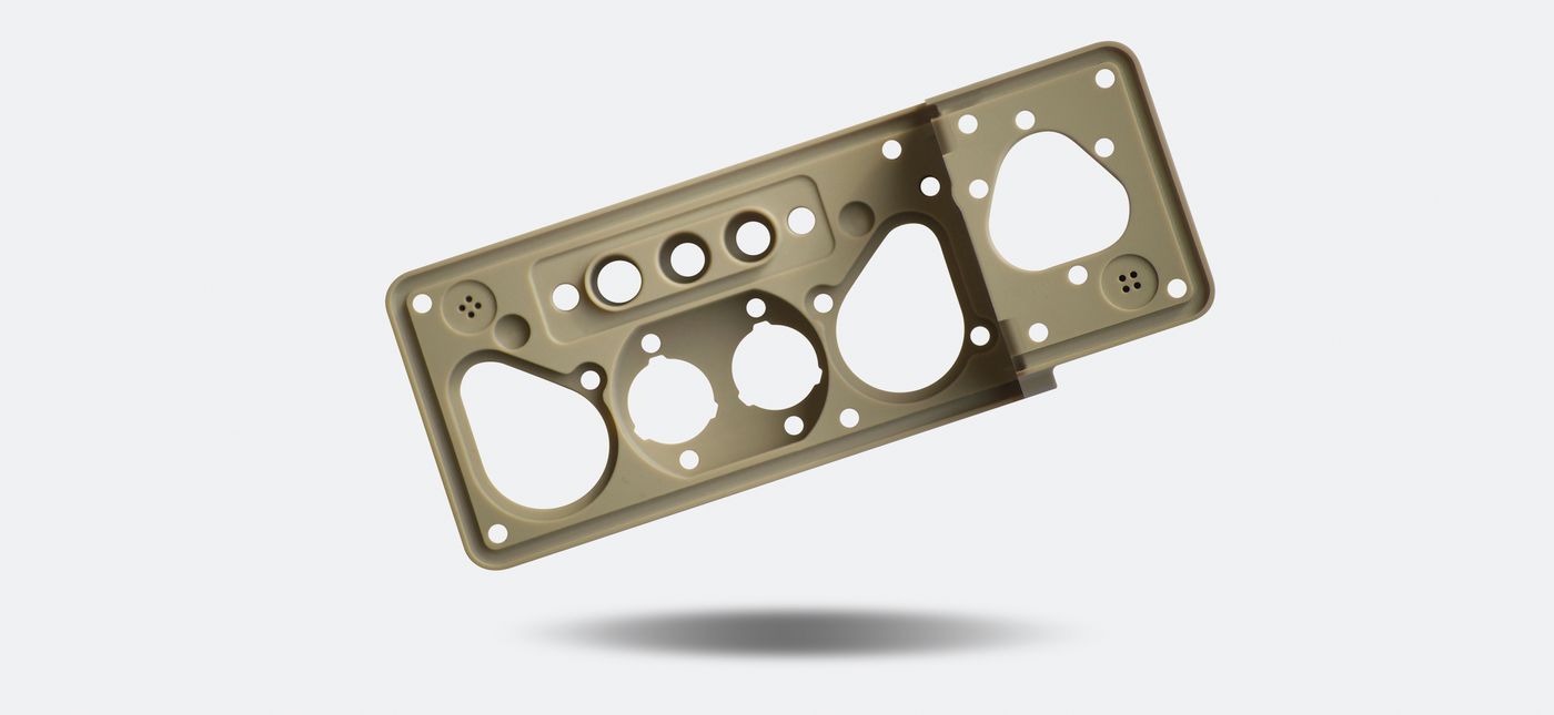Precision micro-machined engineering-plastic part (14)